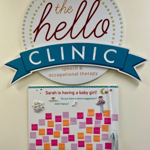 Posterboard at The Hello Clinic: "Sarah is having a baby girl. Do you have a name suggestion?" 