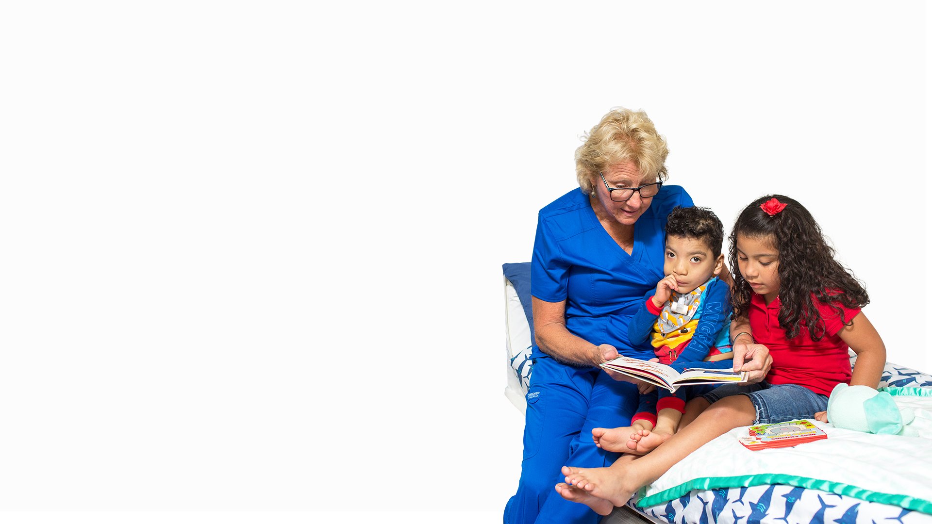 nurse-reading-to-young-children